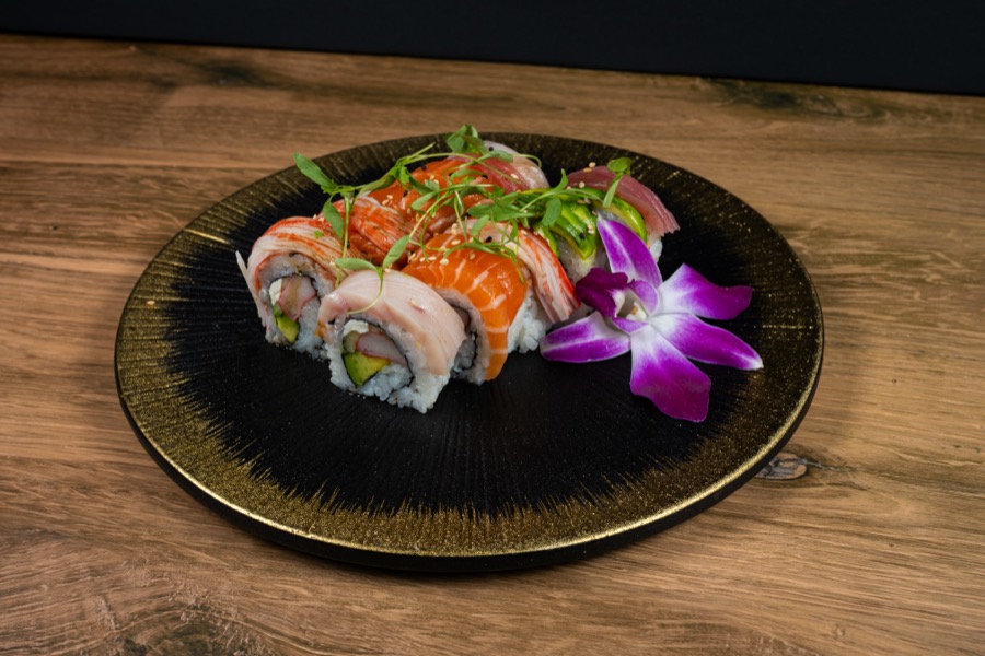 Sushi roll on a gold plate