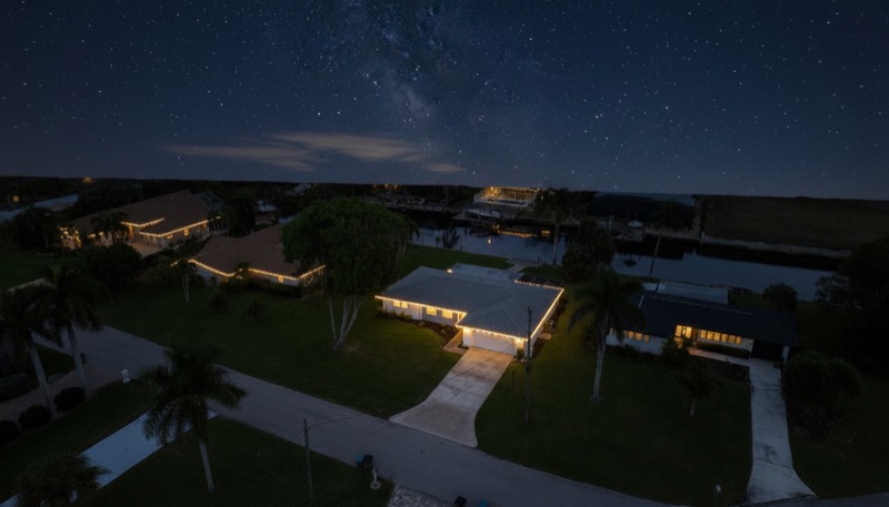 Aerial view of the home at night