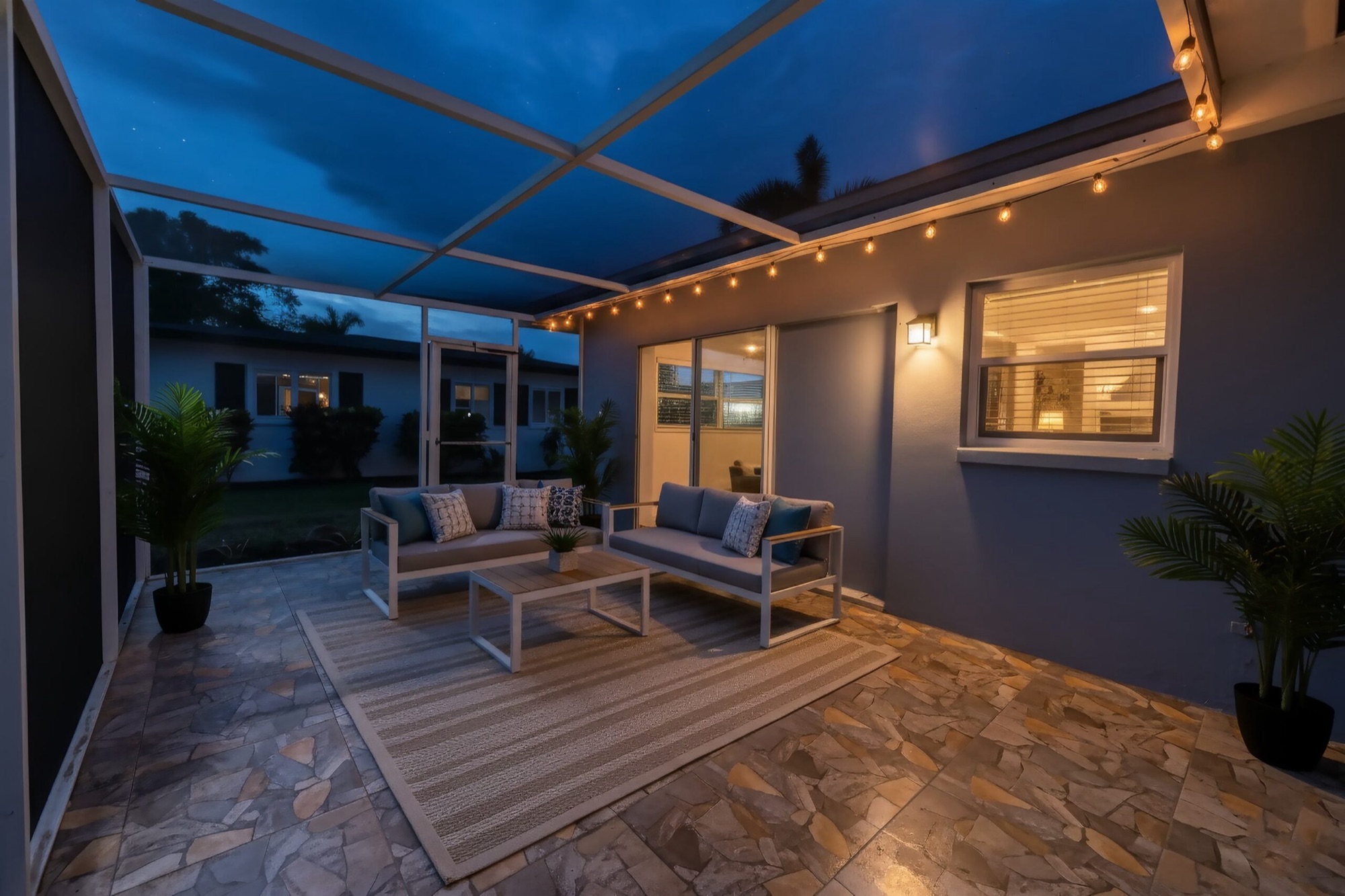 Same backyard lanai at twilight