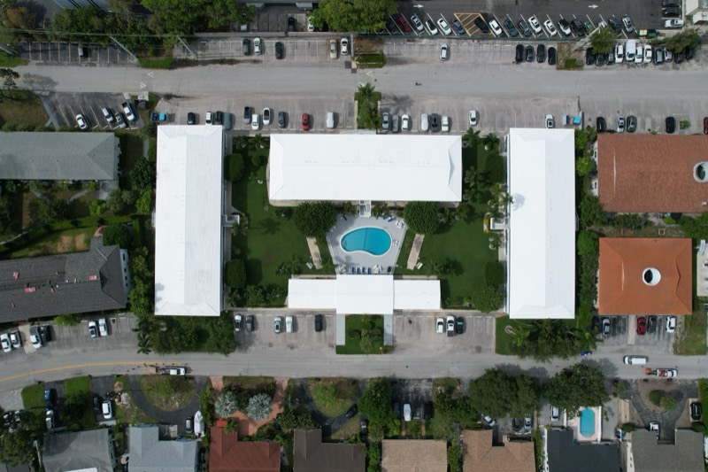 Top-down drone view of a condo courtyard
